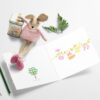 Rosa babyklær på snor - nydelig babykort til babyshower eller barndåp